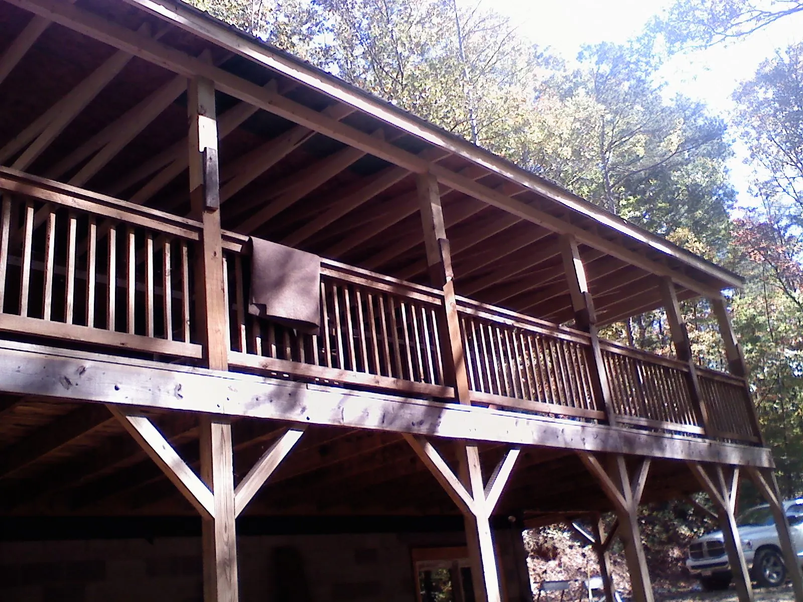 Timber framing under a new elevated porch and deck — Roof Leak Repair in Jacksontown by Roofing Brothers